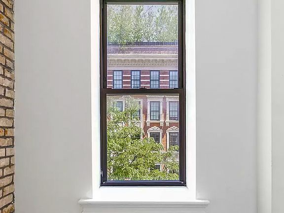 5th image of 50 E 3rd St APT 5A