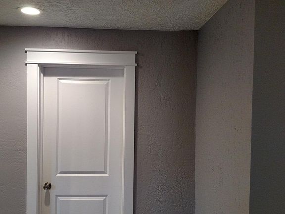 Custom framing on all the doors. Fresh paint on all the walls.