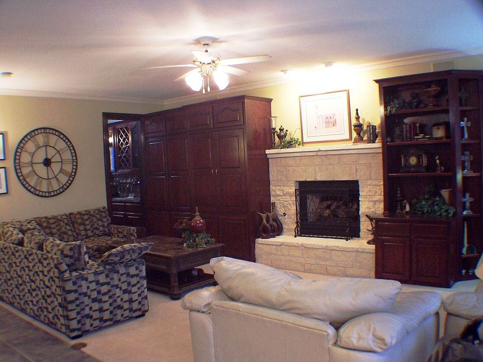 Den with Austin stone fireplace