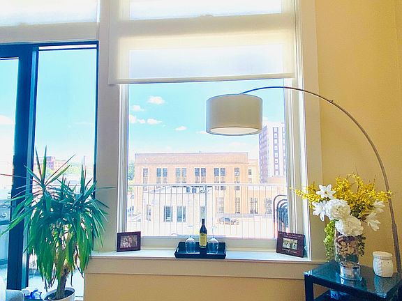 View from Main Living Room and Kitchen out to Balcony
