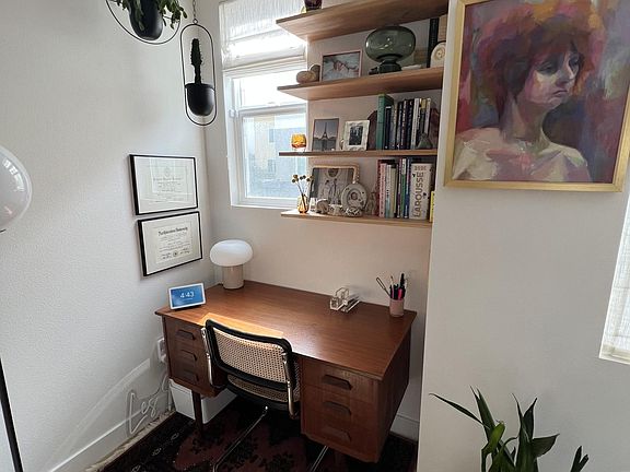 Side space in living room, ideal for a dedicated work station
