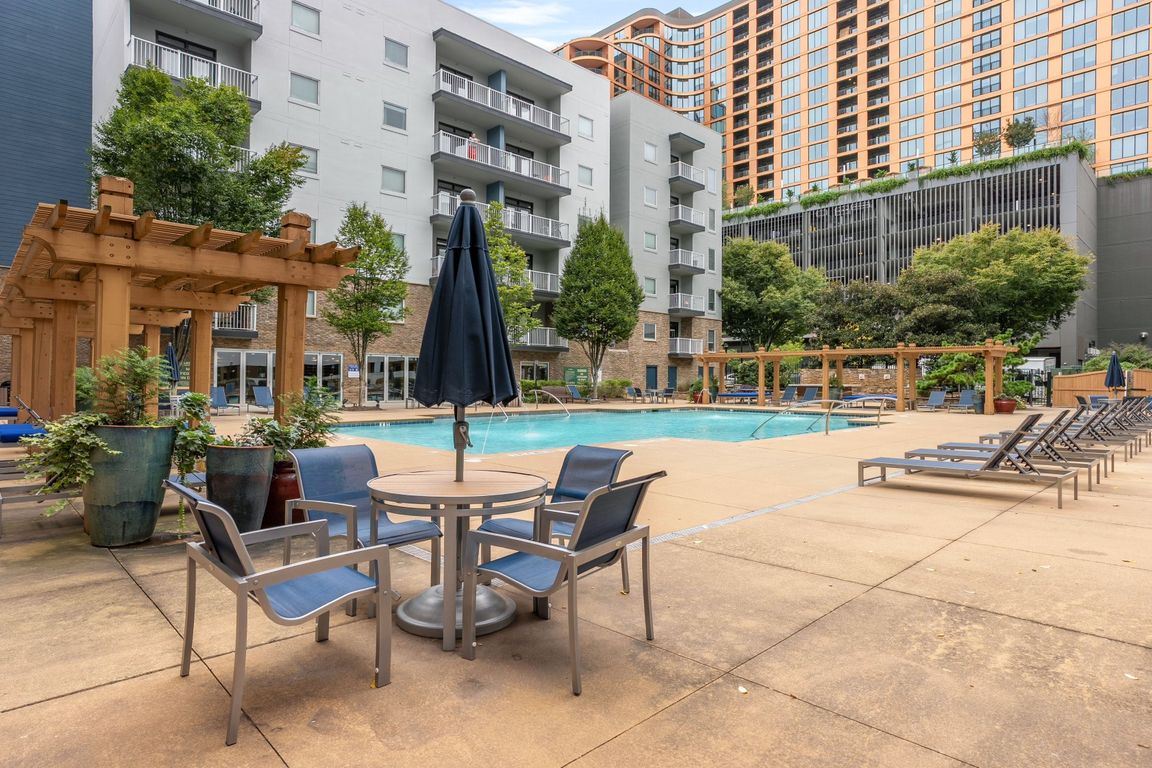 Soak up the sunshine by the sparkling pool.