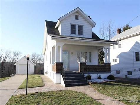 3 bedroom 2-story on a private wooded double lot. Enjoy the covered front porch and brand new driveway. 1 car dtached garage with opener.