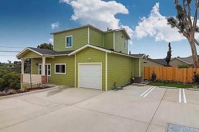 Beautiful two story home with attached garage and community parking space