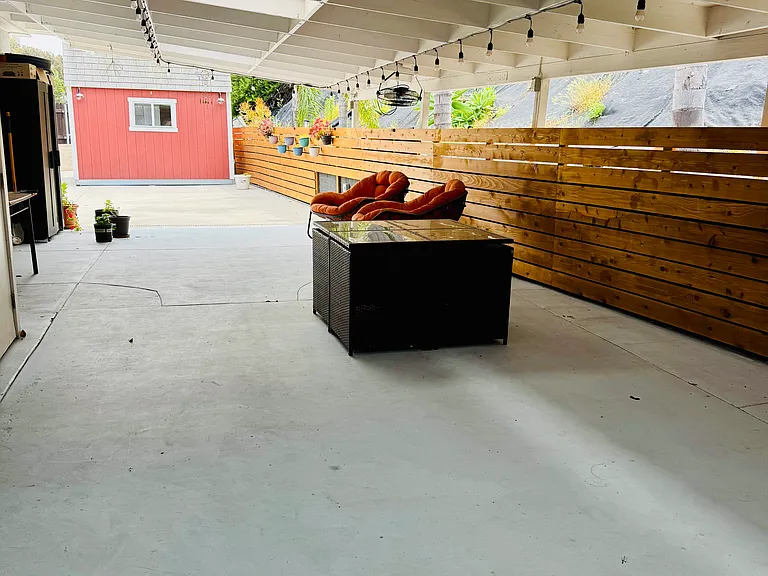 View from work out room to covered patio