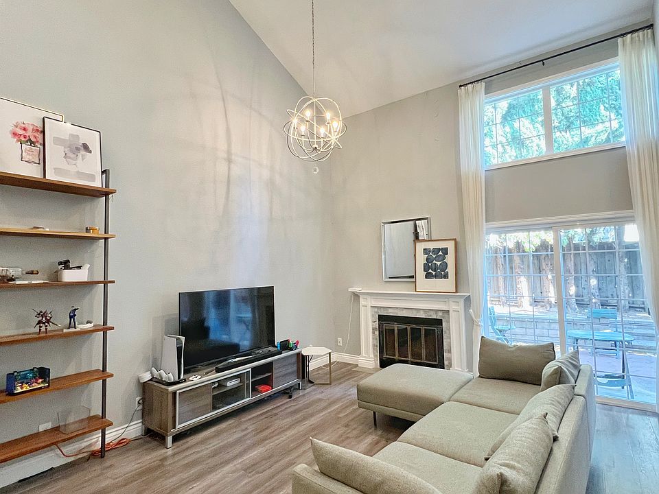 Living room with high vaulted ceiling