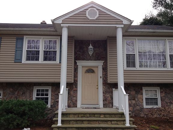 Stone front and professional landscaping