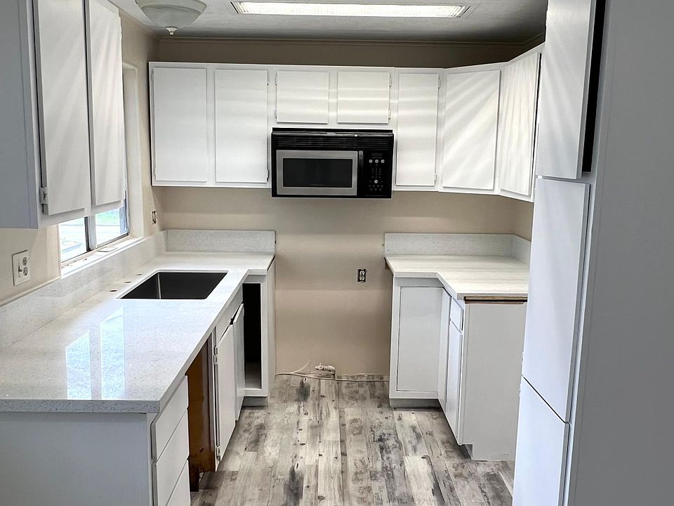 Freshly painted cabinets and New Countertops
