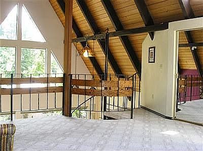 Master loft bedroom den with private bath and deck