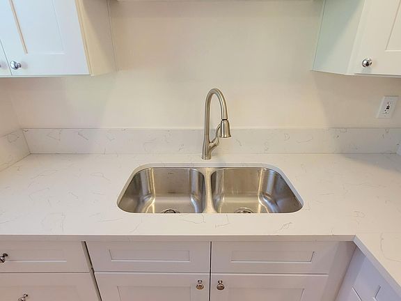 Stainless steel sink and new countertops