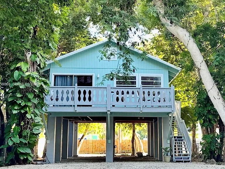 130 NE Gumbo Limbo Dr — Photo 1