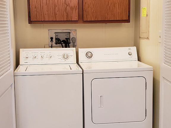Laundry area beside kitchen
