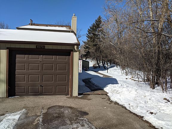 single stall detached garage, sidewalk to front door