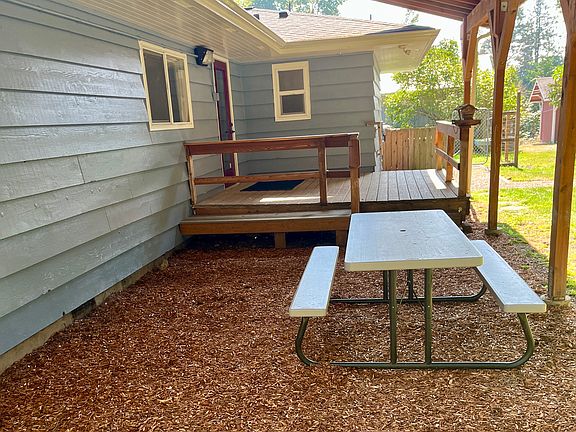 Enjoy the beautiful forested grounds year round in this covered space. Deck off of one of the bedrooms allows a private entrance.