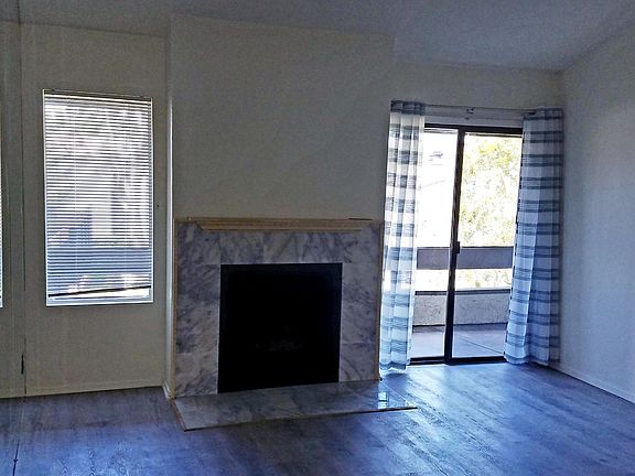 Living room with marble fireplace