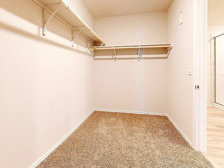 Walk-in closet in the master bedroom
