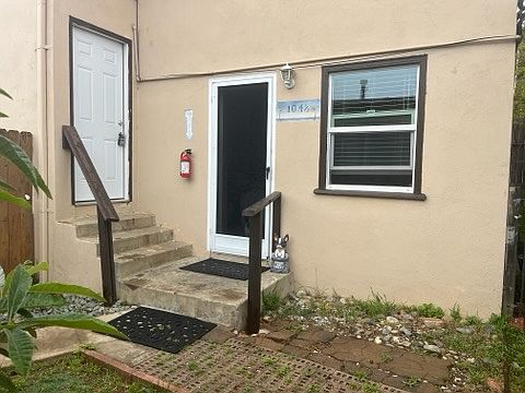 Laundry Room Door at top of the stairs. Deluxe Large LG Washer & Dryer inside