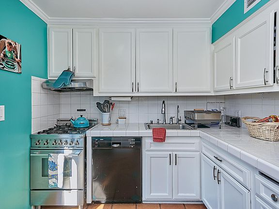 Kitchen with lots of built-ins for storage.