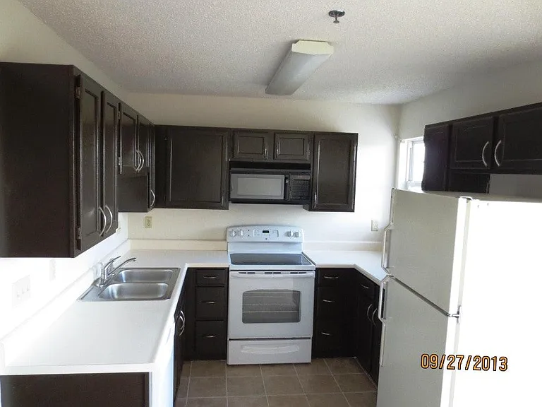 The kitchen with all appliances