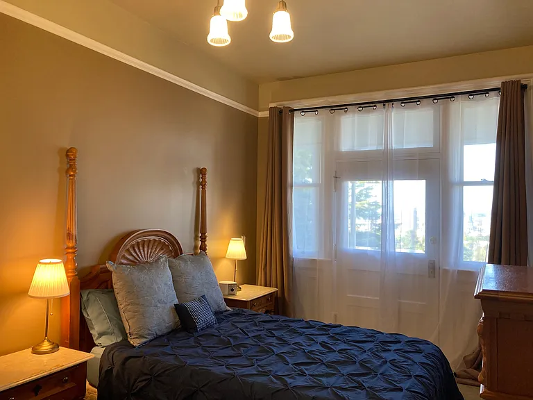 Bedroom with private entrance and porch area with view