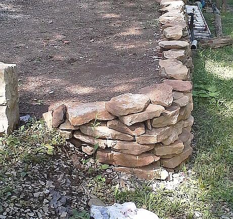 stone wall/side of house