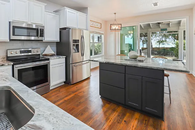 Kitchen Open to Screened Patio with Views!