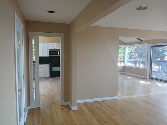 Spacious, liveable, open floorplan. Great flow from a liveable, warm kitchen with stainless appliances, living space, dining area options. High bank waterfront from almost every room!