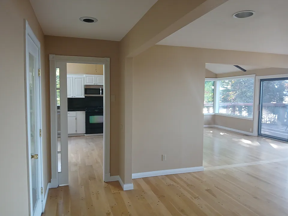 Spacious, liveable, open floorplan. Great flow from a liveable, warm kitchen with stainless appliances, living space, dining area options. High bank waterfront from almost every room!