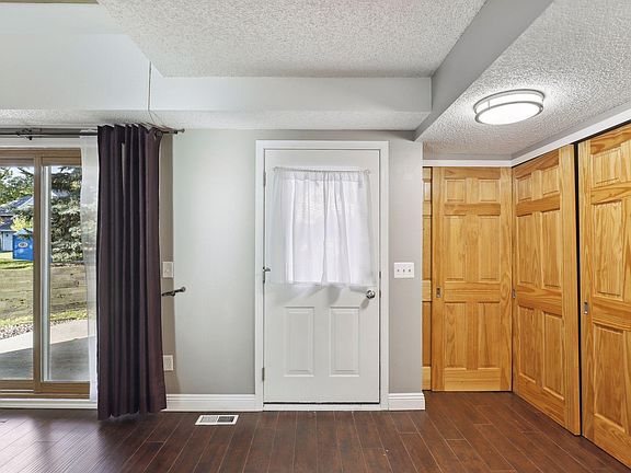 Front Door and Patio Door. Lots of storage in entryway.