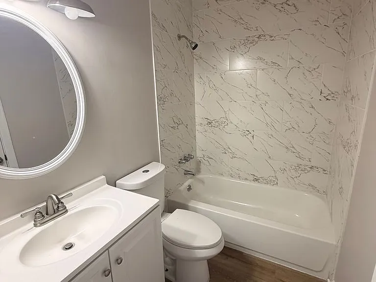 5015 Wellsworth Ave — Photo 6