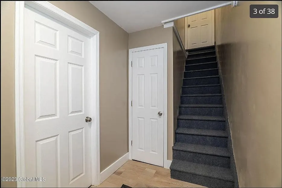 Stairs on right side leading to apartment. - Elk St
