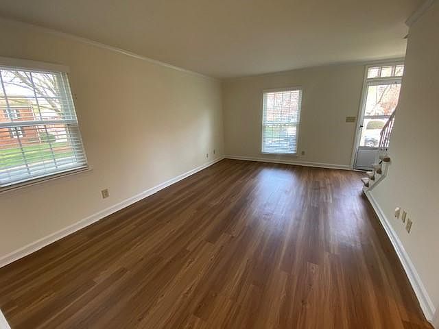2 BR Townhome: Hardwood like flooring throughout downstairs in select units