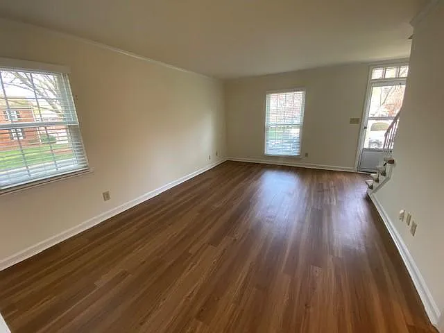 2 BR Townhome: Hardwood like flooring throughout downstairs in select units