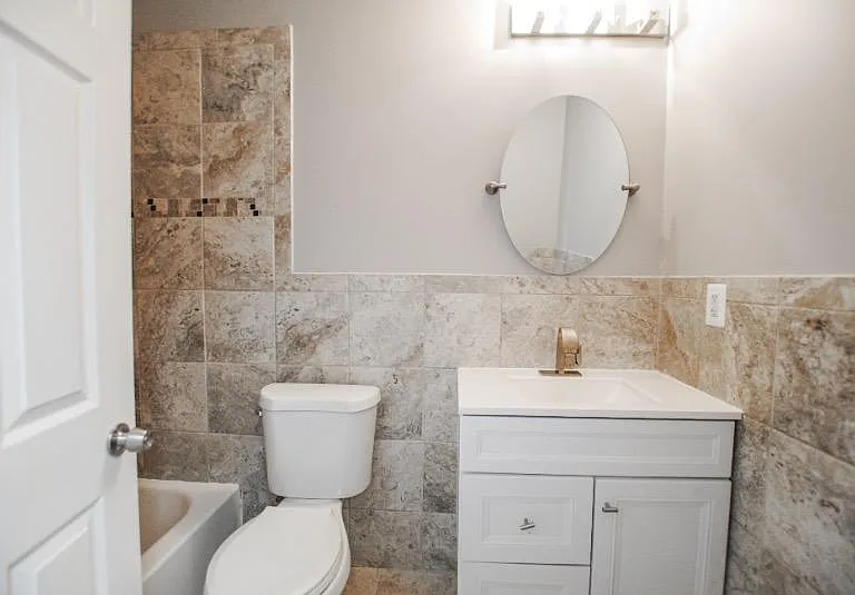 Head upstairs to find 2 bedrooms, a den, and bathroom