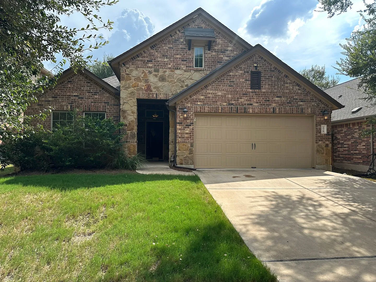 179 Blushing Dr 78610 | 4 Bed 2 Baths 2 Car Garage $2595 — Photo 1