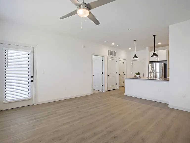 Open-concept floor plans connect your living area seamlessly to the kitchen _ perfect for entertaining. Garrett Harvest Junction West, Longmont, CO.