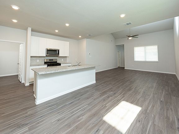 Dining Area to Kitchen and Family Room