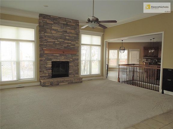 Updated stone fireplace, fireplace has blower to great added warmth on these cold days.