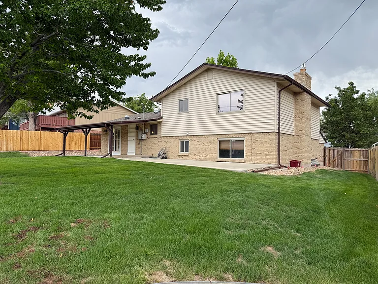 large fully fenced backyard (lawncare included in rent)