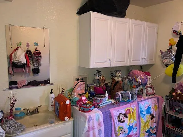 Large laundry room with sink