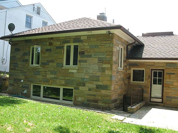 sunny yard- note rear door has been updated and replaced with full panel glass; storm door remains