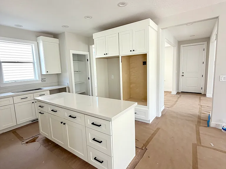 New cabinet, countertops, appliances and flooring