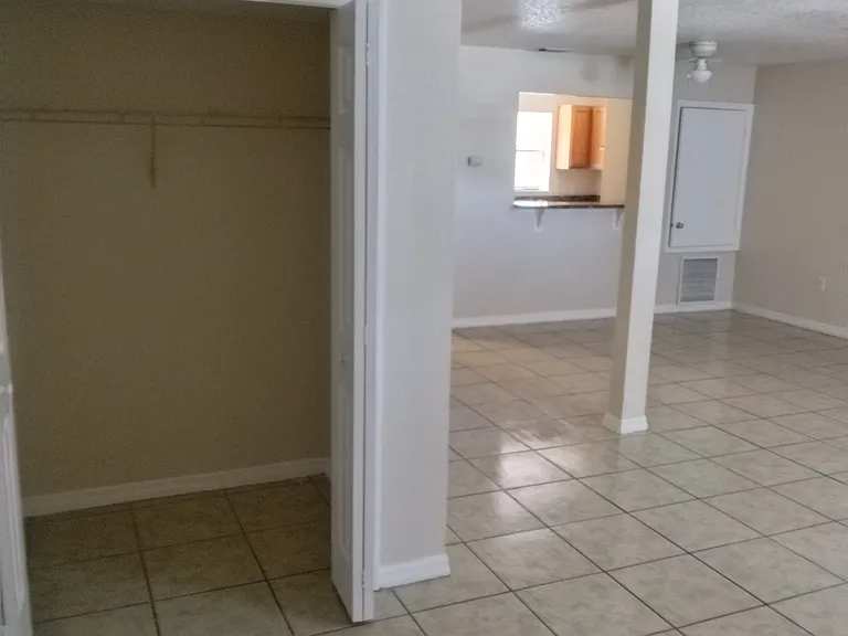 Large walk-in closet for storage.