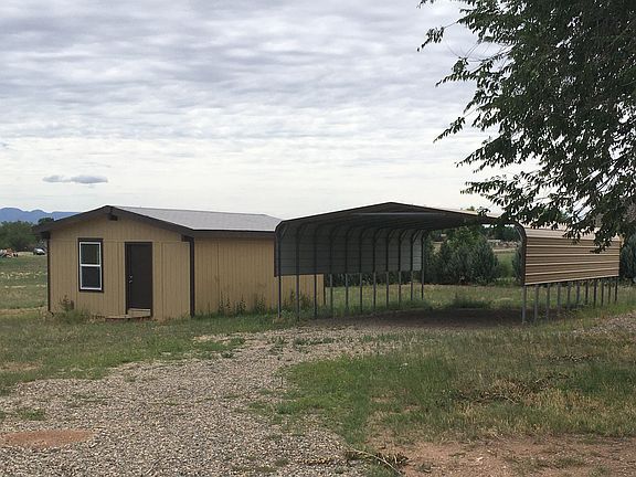 Carport & 480 sq. ft. Den/Office/Studio Out Building
