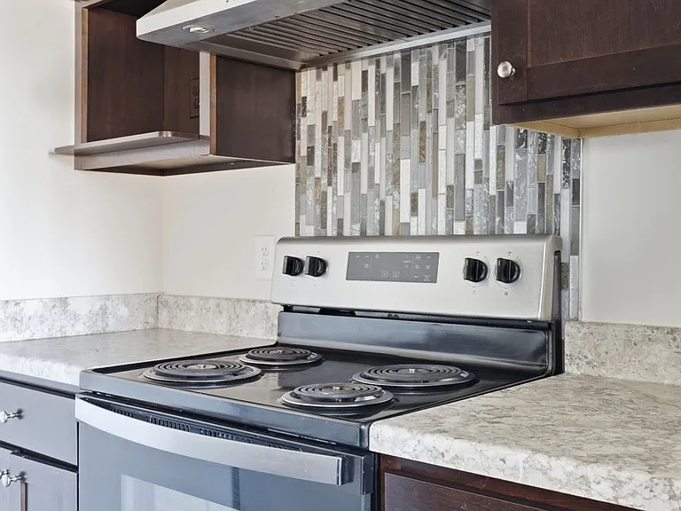 Elevate your lifestyle at St. Anthony Group with our modern kitchens featuring sleek appliances and stunning countertops. Perfect for culinary enthusiasts, this space invites creativity. Explore your new home today!