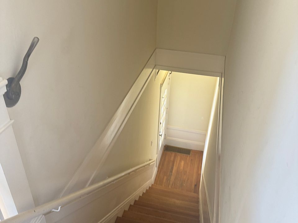 The entryway retains the 1920's mechanism to open and close the front door, tho at 100 years old, we do not know how long it will last.