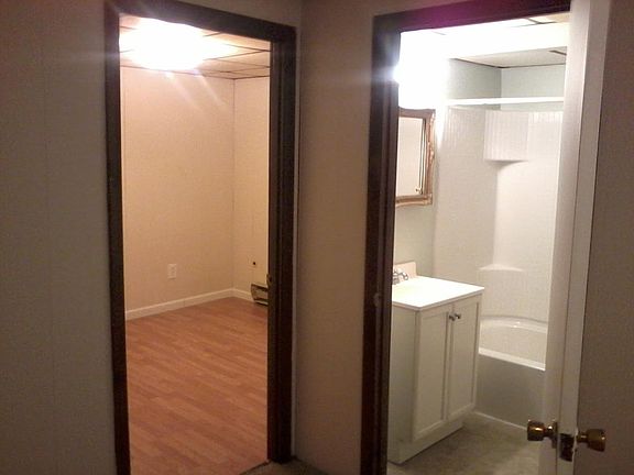 Bedroom (on left) and Bathroom.