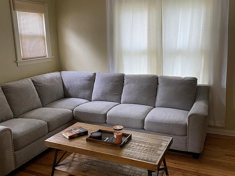Living room with hardwood floors that were refinished 3 years ago.