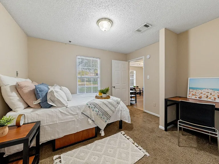 Spacious Bedroom with Desk and Study Space