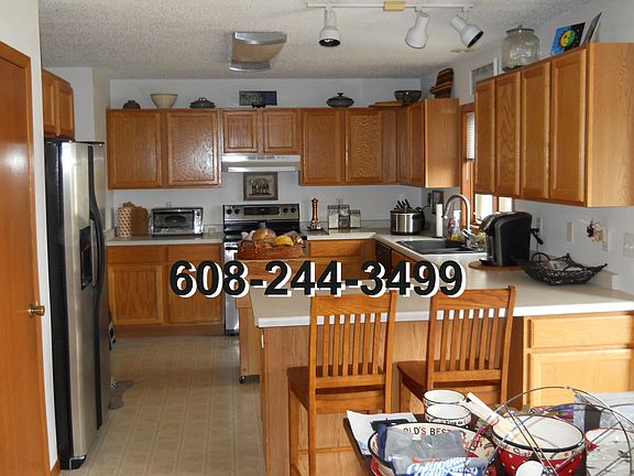 4th image of 5889 Woodland Dr
